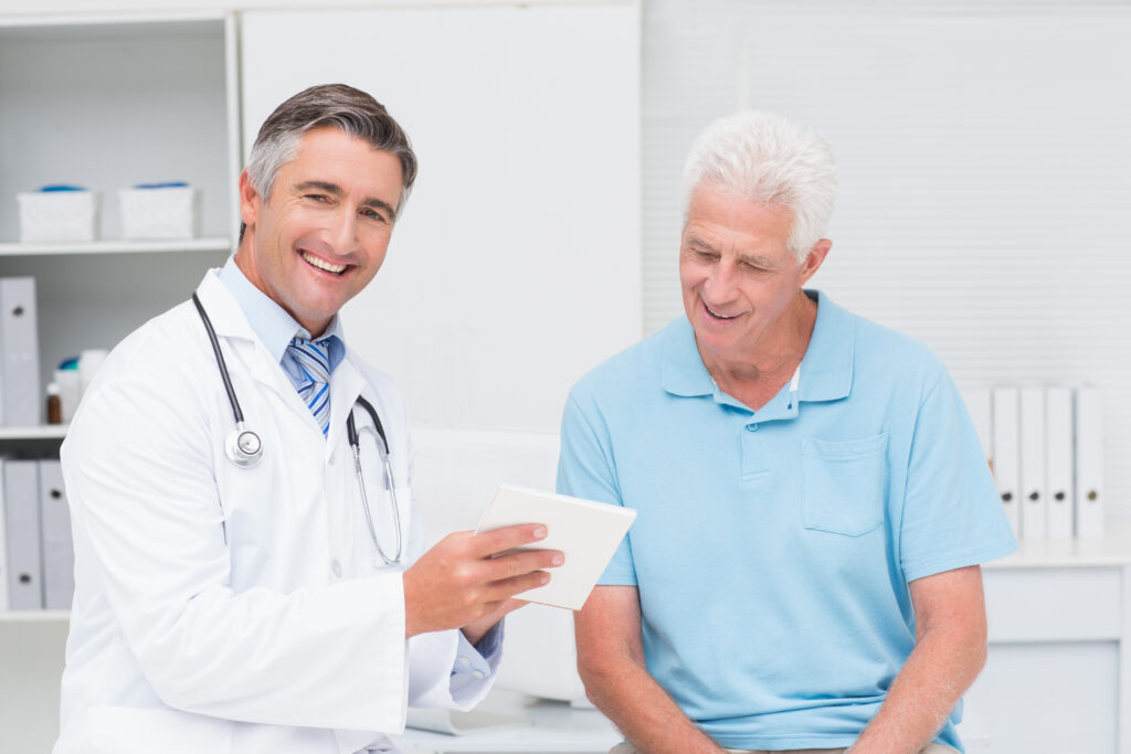 ankylosing spondylitis a doctor with his patient smiling