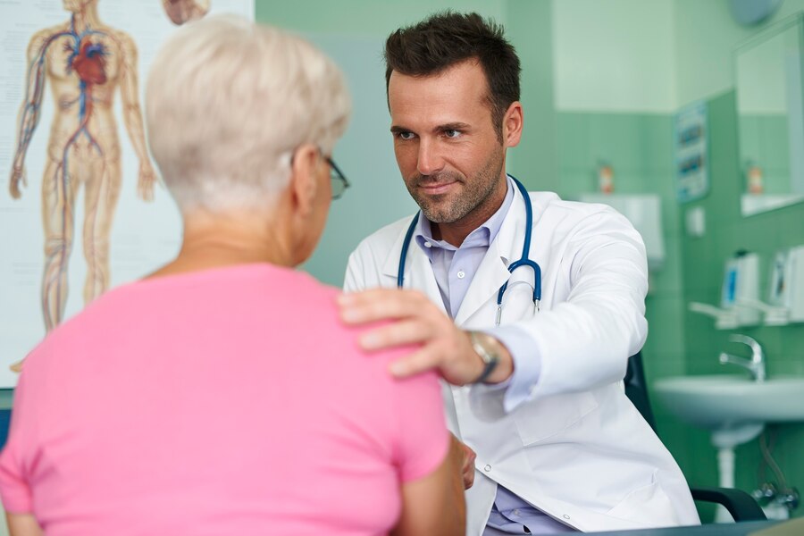 doctor of wegener's with patient in infusion center of de delaware