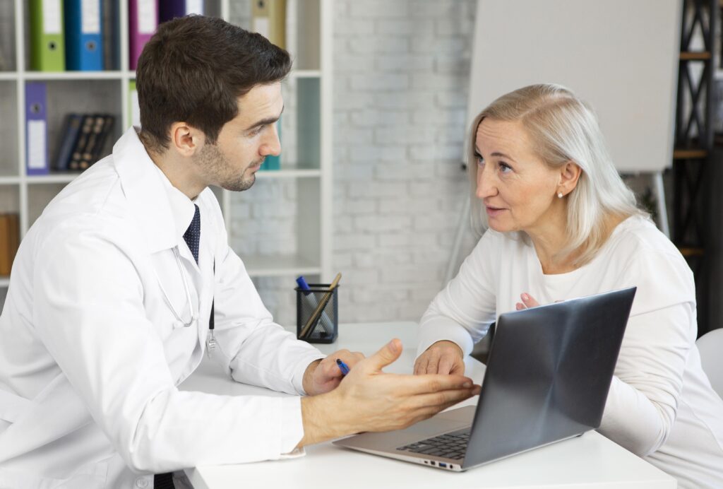 dover infusion denter doctor talking with patient